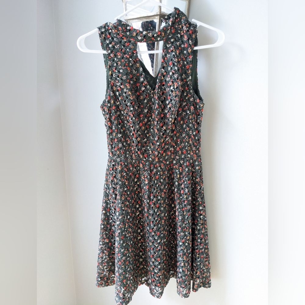 Women's textured floral dress. Knee length. Olive green. Size Small.